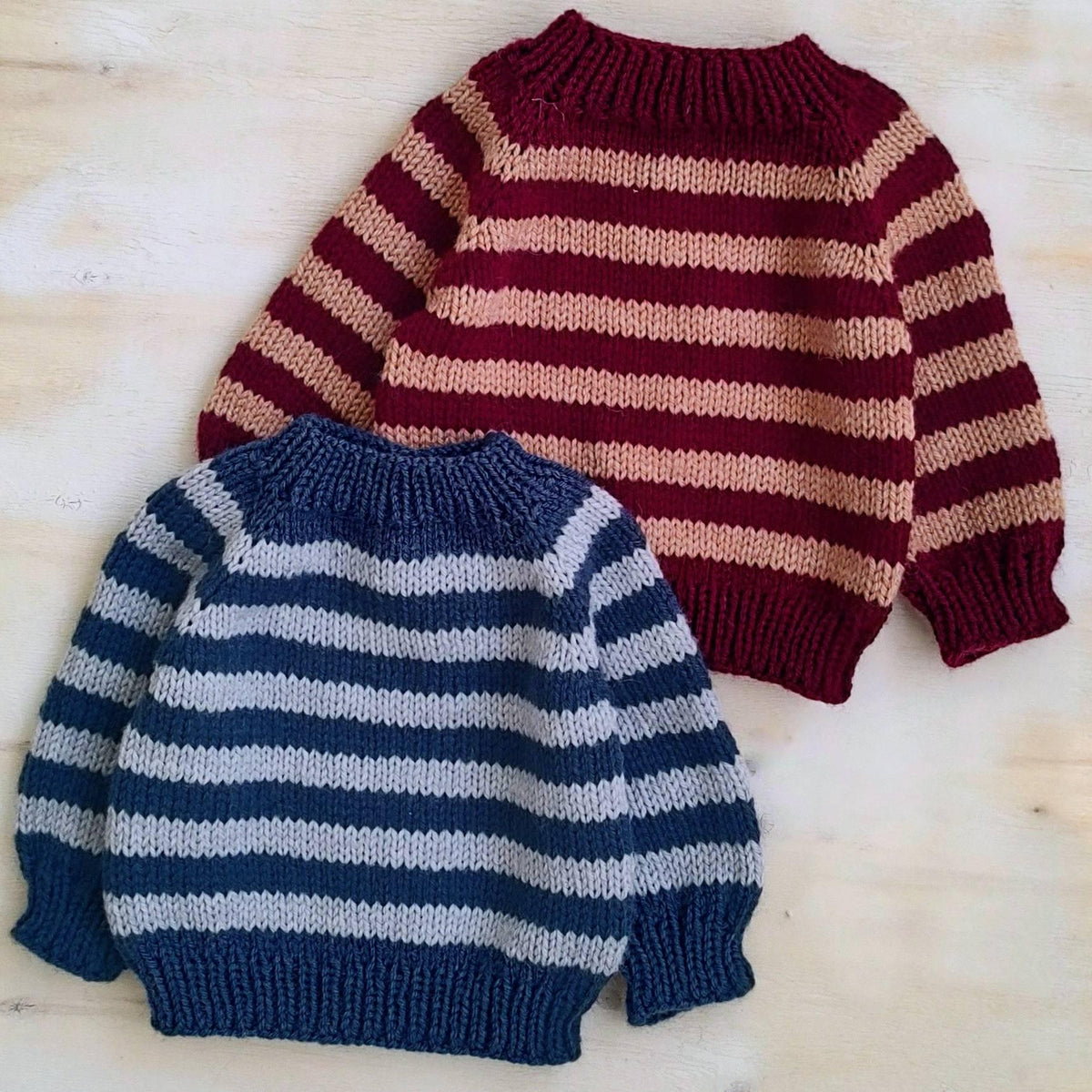 Sailor Stripe Baby Sweater — two finished colour options