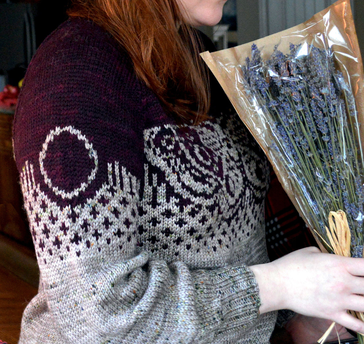 Moon Moth sweater worn, showing sleeve and moth colorwork