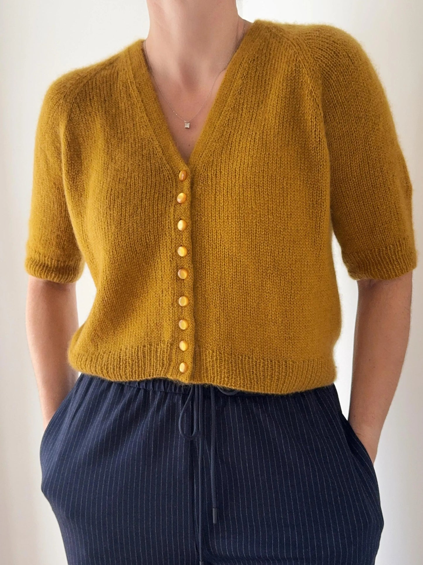 Refined Buttoned Knit Blouse Knitting Pattern
