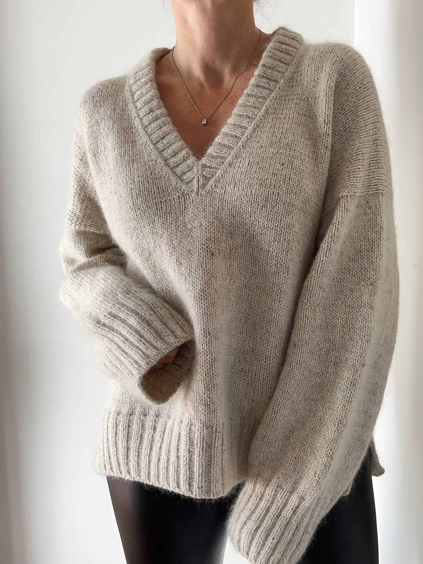 Graceful V-Neck Yoke Pullover Knitting Pattern