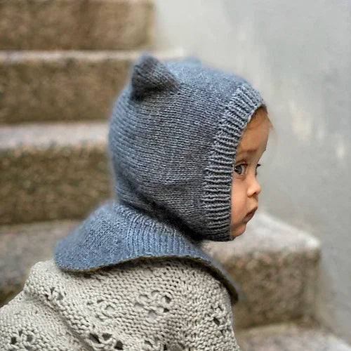 Side view of the grey knitted bear-ear hood